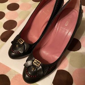 Black Fendi shoes with bow and logo